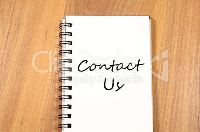 Contact us write on notebook