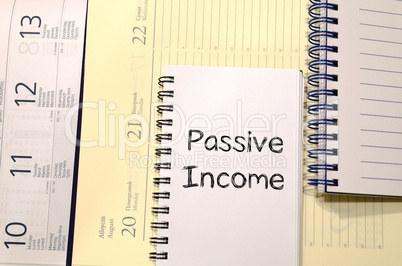 Passive income write on notebook