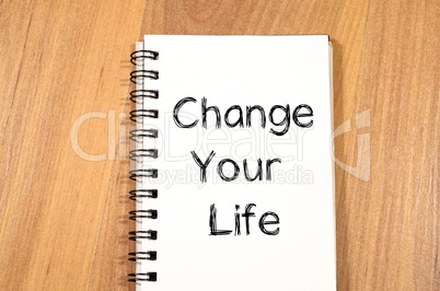 Change your life write on notebook