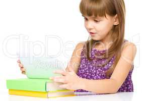 Young girl is using tablet