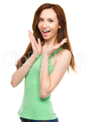 Portrait of a young surprised woman