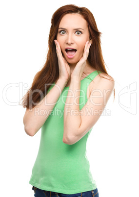 Portrait of a young surprised woman