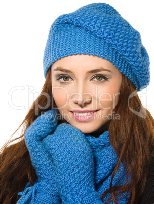 Young happy woman wearing winter cloth