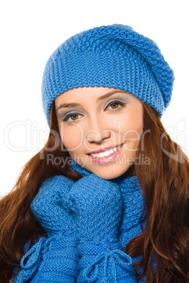 Young happy woman wearing winter cloth