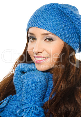 Young happy woman wearing winter cloth