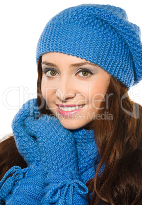 Young happy woman wearing winter cloth