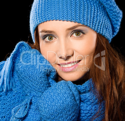 Young happy woman wearing winter cloth