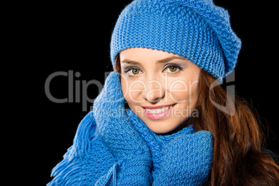 Young happy woman wearing winter cloth