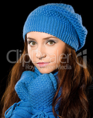 Young happy woman wearing winter cloth