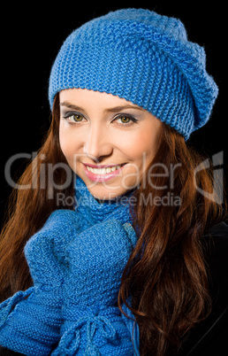 Young happy woman wearing winter cloth
