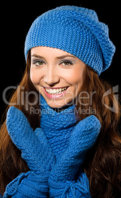 Young happy woman wearing winter cloth