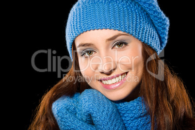 Young happy woman wearing winter cloth