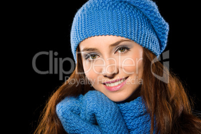 Young happy woman wearing winter cloth