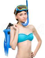 Young woman with snorkel equipment