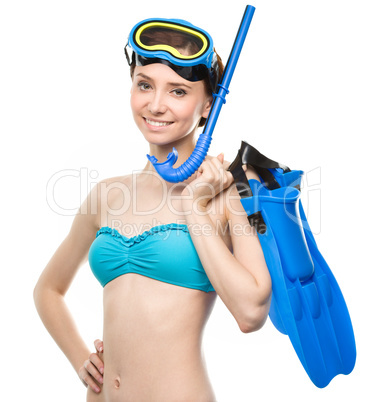 Young happy woman with snorkel equipment