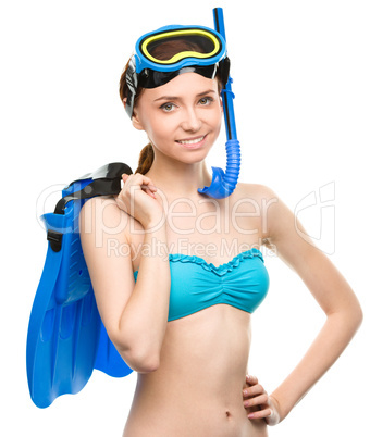 Young happy woman with snorkel equipment