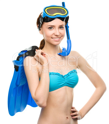 Young happy woman with snorkel equipment