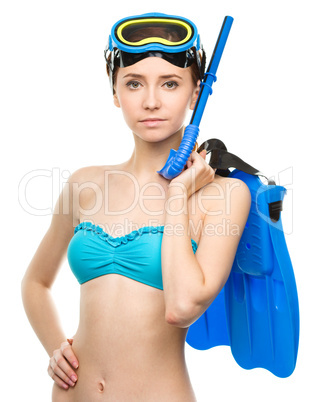 Young woman with snorkel equipment