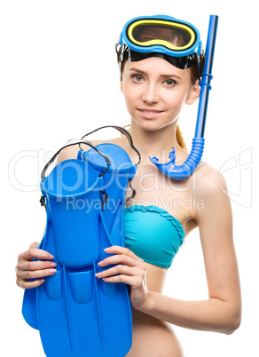 Young happy woman with snorkel equipment