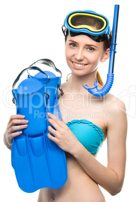 Young happy woman with snorkel equipment