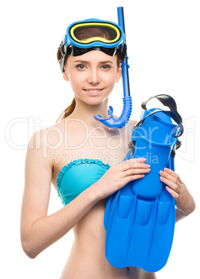 Young happy woman with snorkel equipment