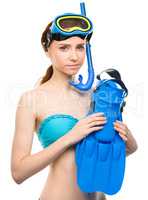 Young woman with snorkel equipment