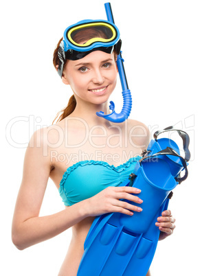 Young happy woman with snorkel equipment