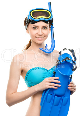 Young happy woman with snorkel equipment