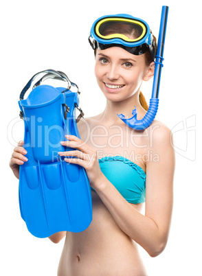 Young happy woman with snorkel equipment