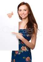 Young woman is holding blank banner