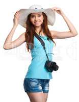 Young woman wearing summer hat