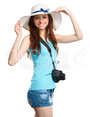 Young woman wearing summer hat