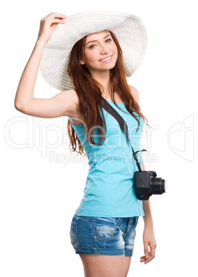 Young woman wearing summer hat