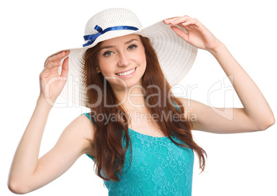 Pretty woman wearing summer hat