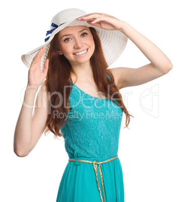 Pretty woman wearing summer hat