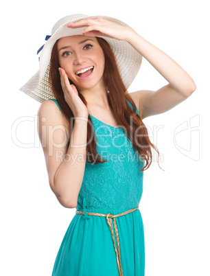 Pretty woman wearing summer hat