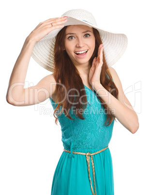 Pretty woman wearing summer hat