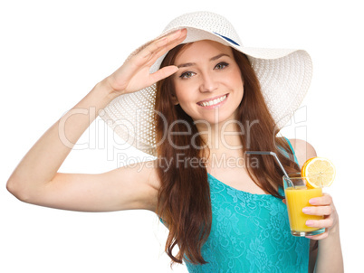 Young woman wearing summer hat