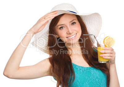 Young woman wearing summer hat