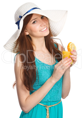 Young woman wearing summer hat