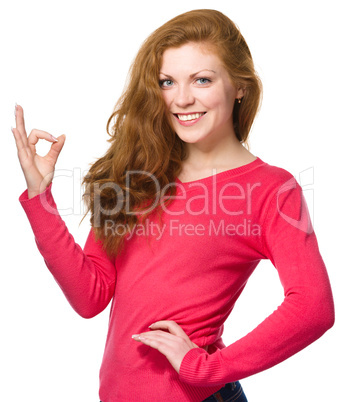 Woman is showing OK sign