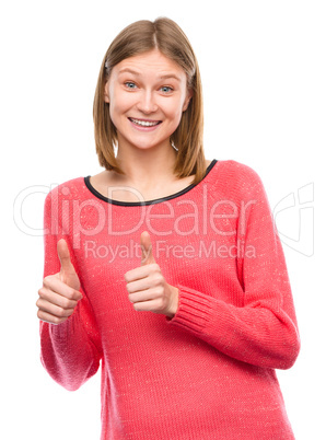 Woman is showing thumb up gesture