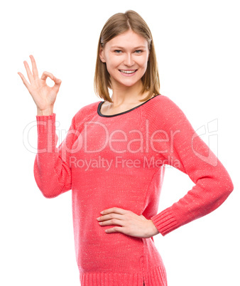 Woman is showing OK sign