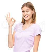 Woman is showing OK sign