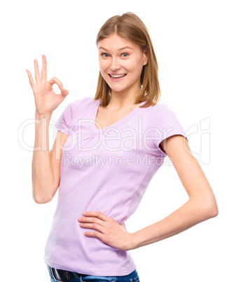 Woman is showing OK sign