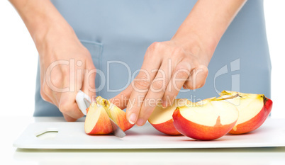 Cook is chopping apple Cook is chopping apple
