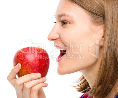 Young happy girl with apple