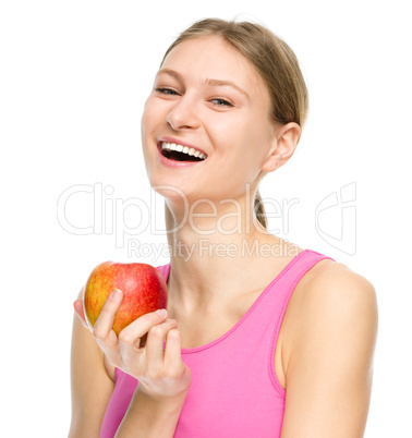 Young happy girl with apple Young happy girl with apple