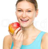 Young happy girl with apple