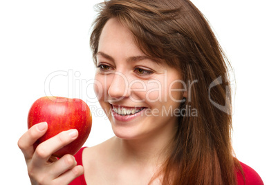 Young happy girl with apple